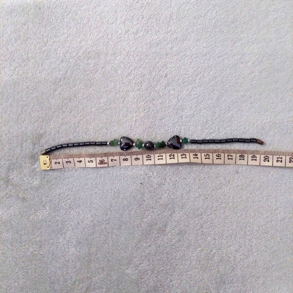 Black metallic heart bracelet with dark green gems. - Picture 2 of 2